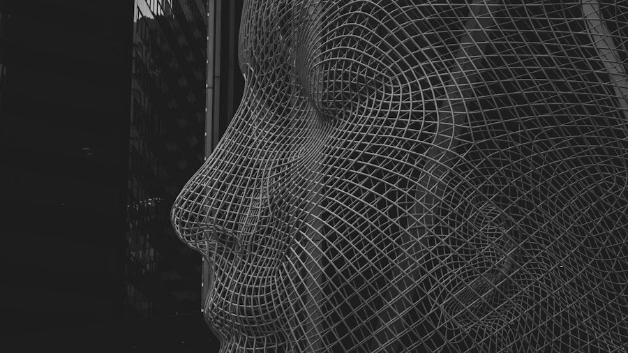 Wireframe mesh of a human face in profile